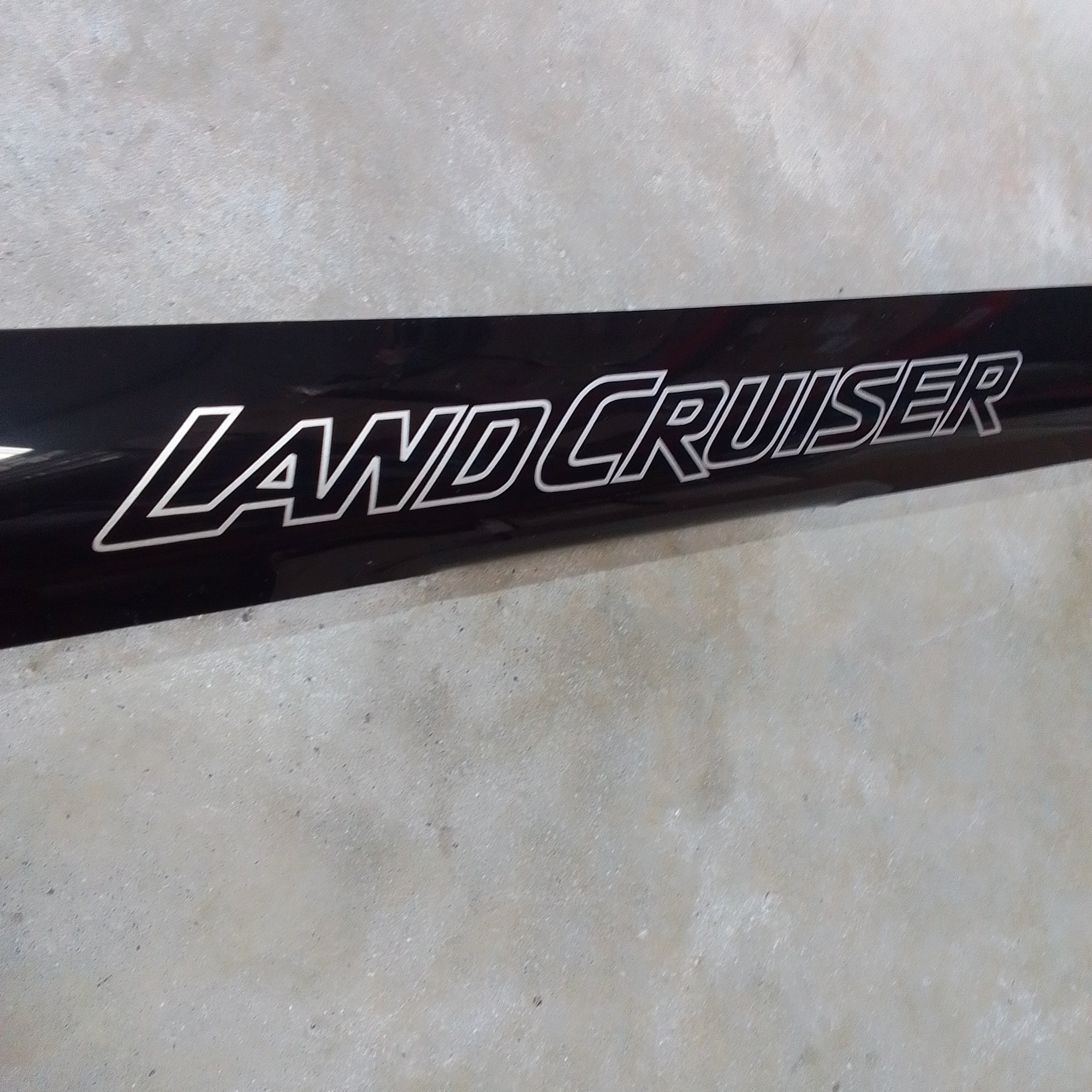 Land Cruiser 79/76 Series slimline gloss black Bonnet Guard/Protector with logo.