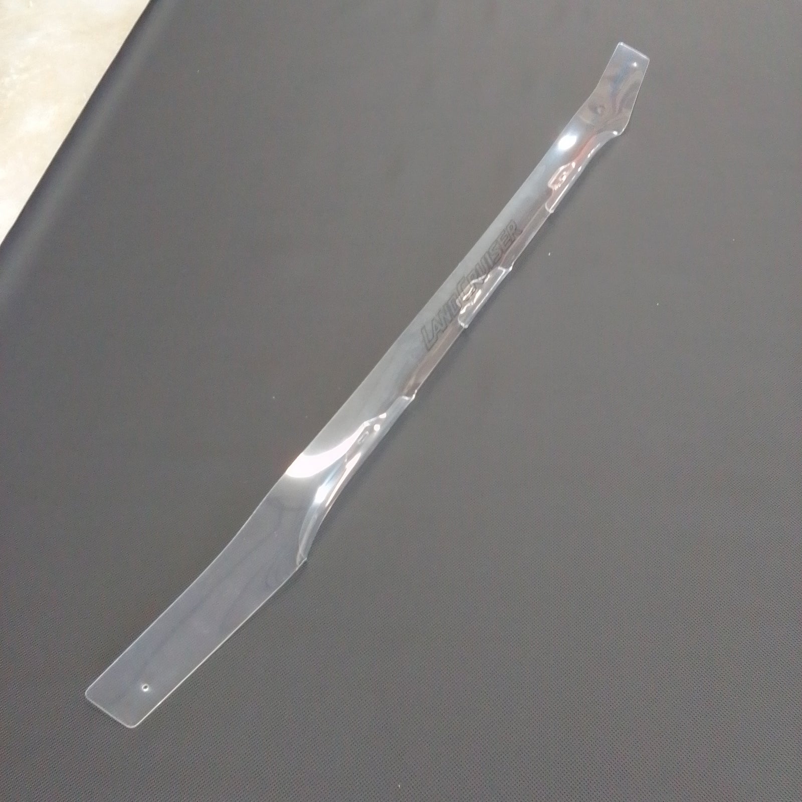 Toyota Land Cruiser 79/76 Series Bonnet Guard/Protector Clear With Logo.