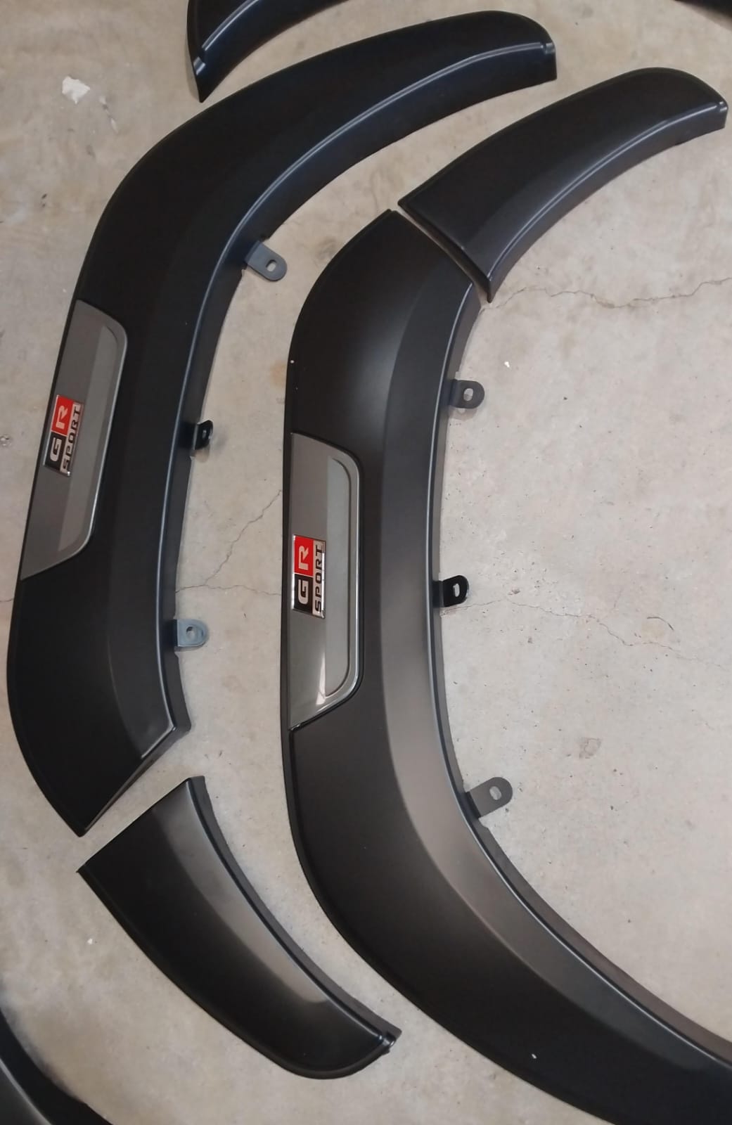 Toyota Hilux Revo 2016-23 GR fender flares smooth matt black with grey inserts