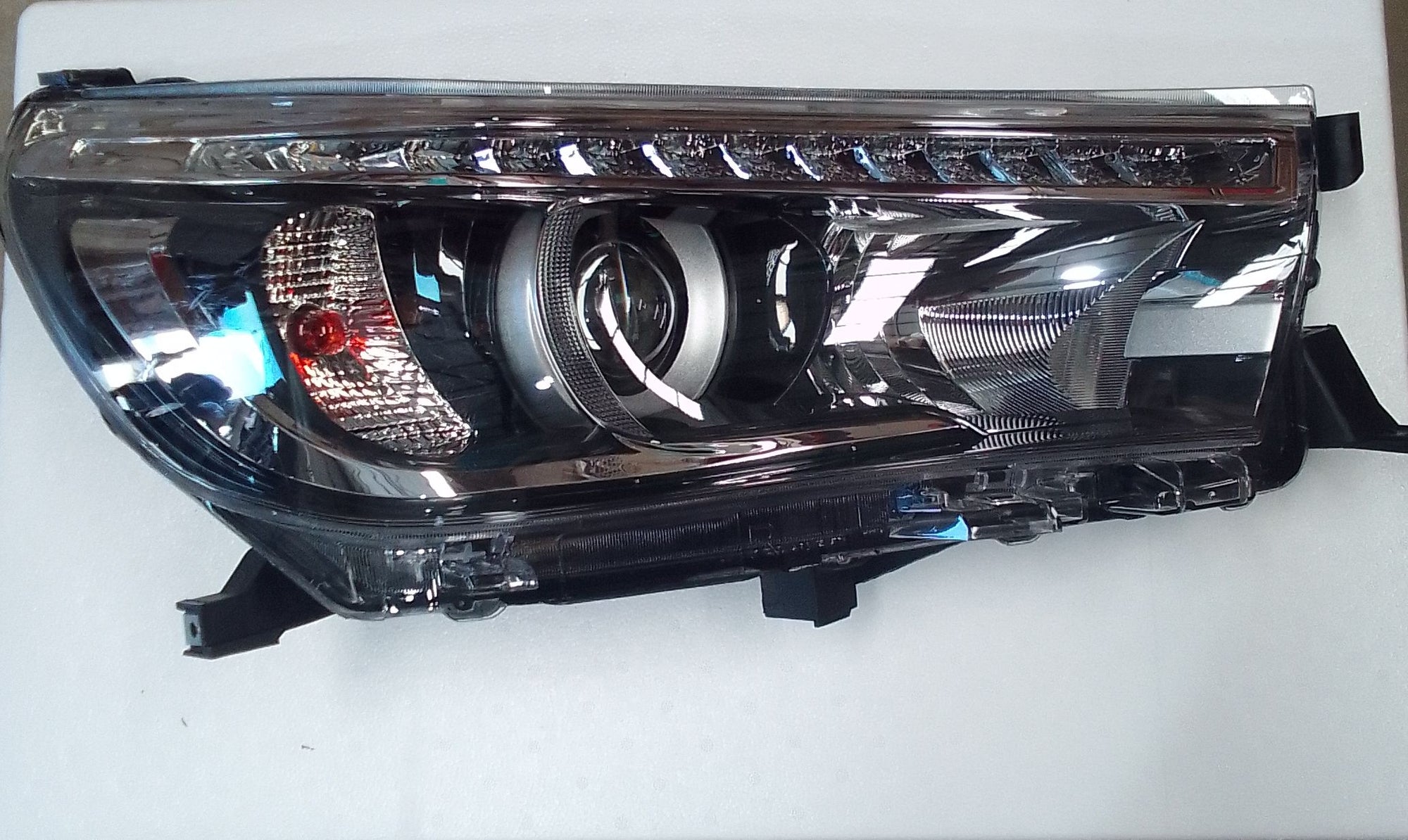 Toyota Hilux Revo headlight with top DRL 2016+